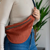 Rust Coloured Linen Cross Body Bag shown worn on the hip from Helen Round