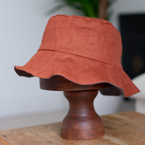 Rust Coloured Linen Bucket Hat from the Maker Collection by Helen Round