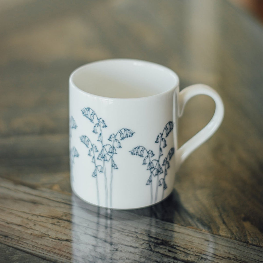 Bluebell Mug in Fine Bone China. White with blue print from the Bluebell Collection by Helen Round. Dishwasher safe.