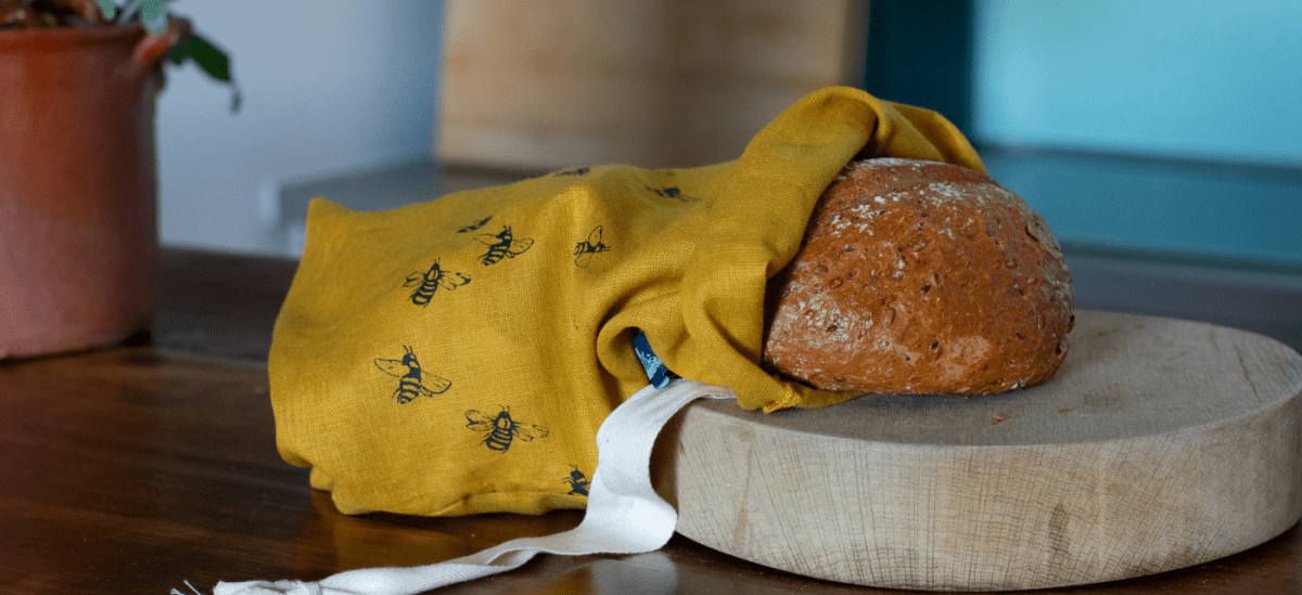 Mustard Linen Bee Bread Bag with loaf of bread from Helen Round