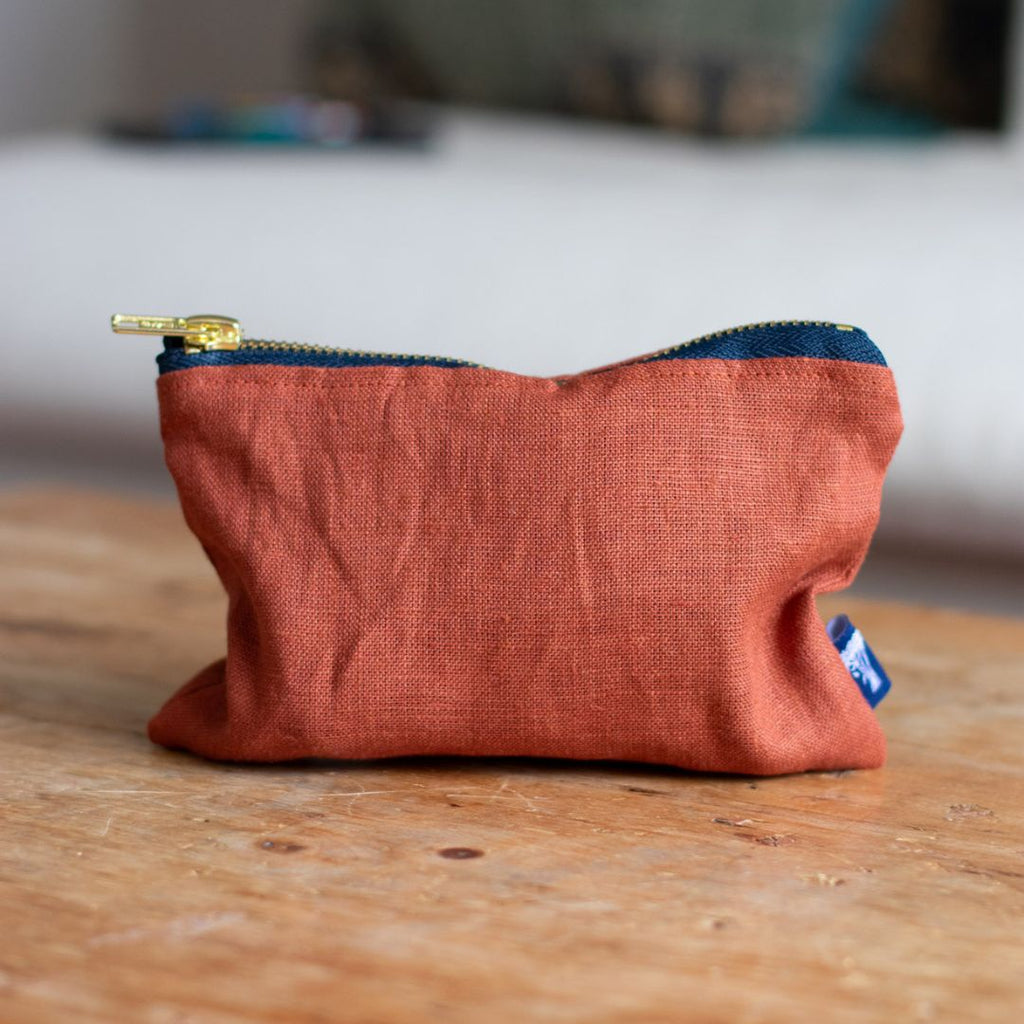 Rust Coloured Linen Pouch with zip and dark blue velvet lining from Helen Round