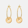 Pair of gold hoop earrings on a white background