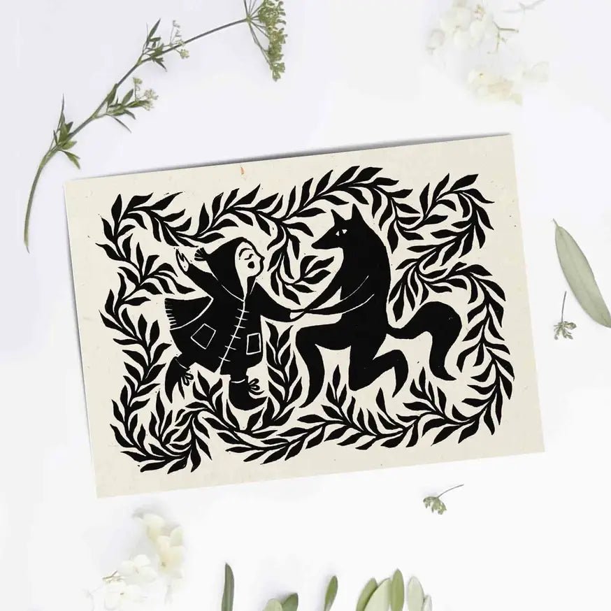 Decorative card with black animal design on a white background