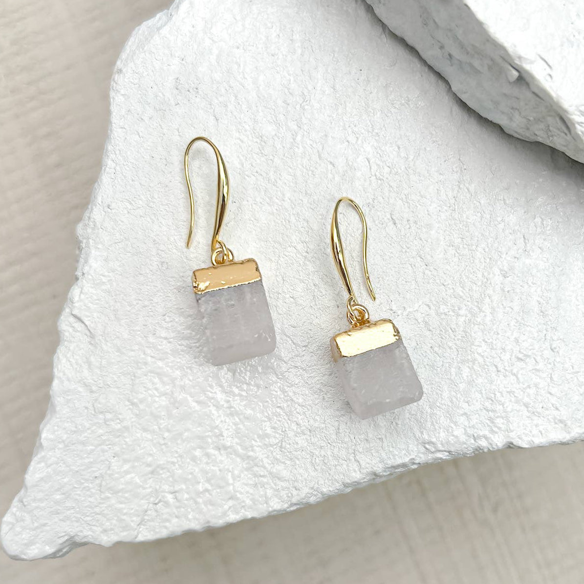 Quartz Cube earrings on a textured white surface sold by Helen Round