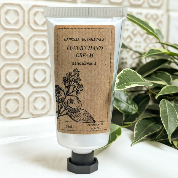 Hand cream tube with sandalwood scent sold by Helen Round