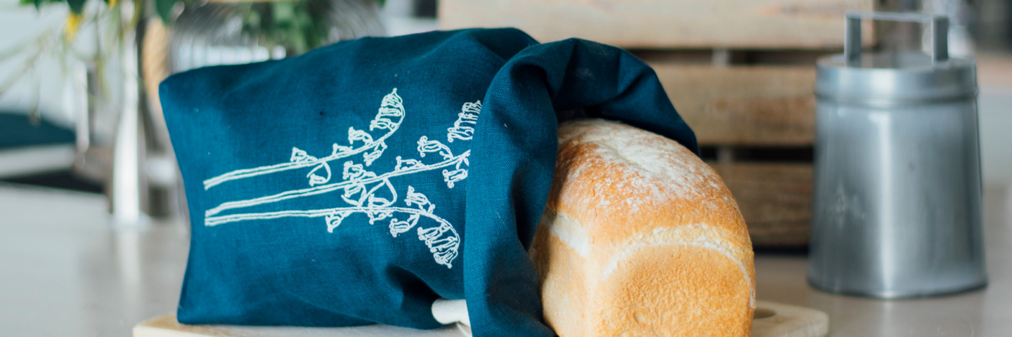 Navy blue linen bread bag with bread