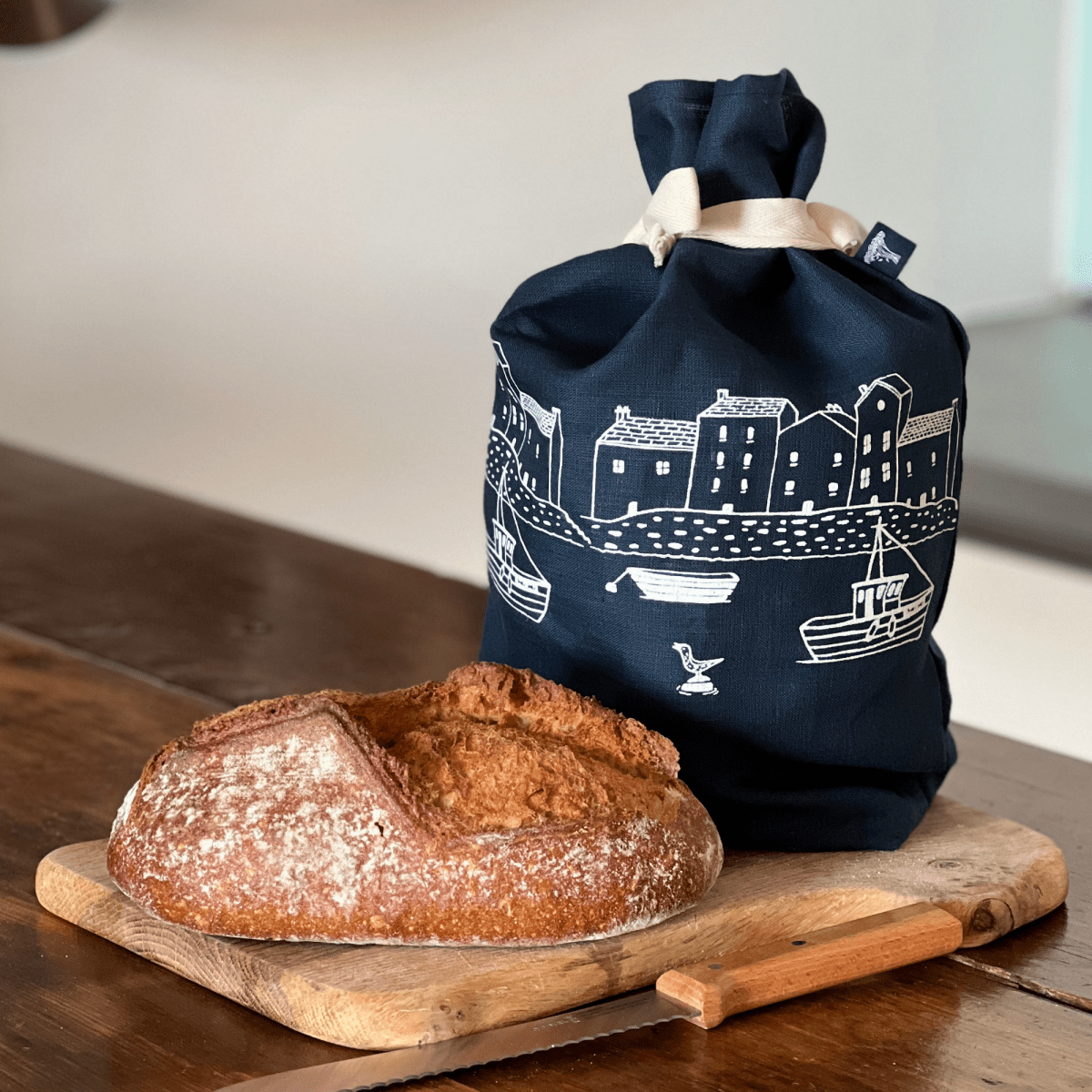 Navy Blue Linen Bread Bag with a screen printed coastal village design by Helen Round 