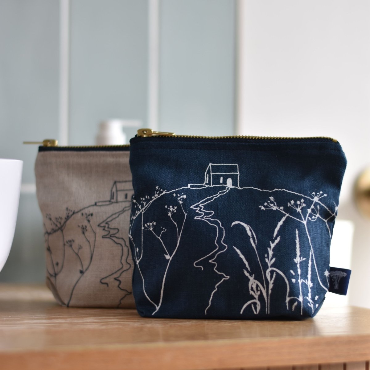 Navy & Natural Linen Makeup Bags screenprinted with Rame Head from Helen Round