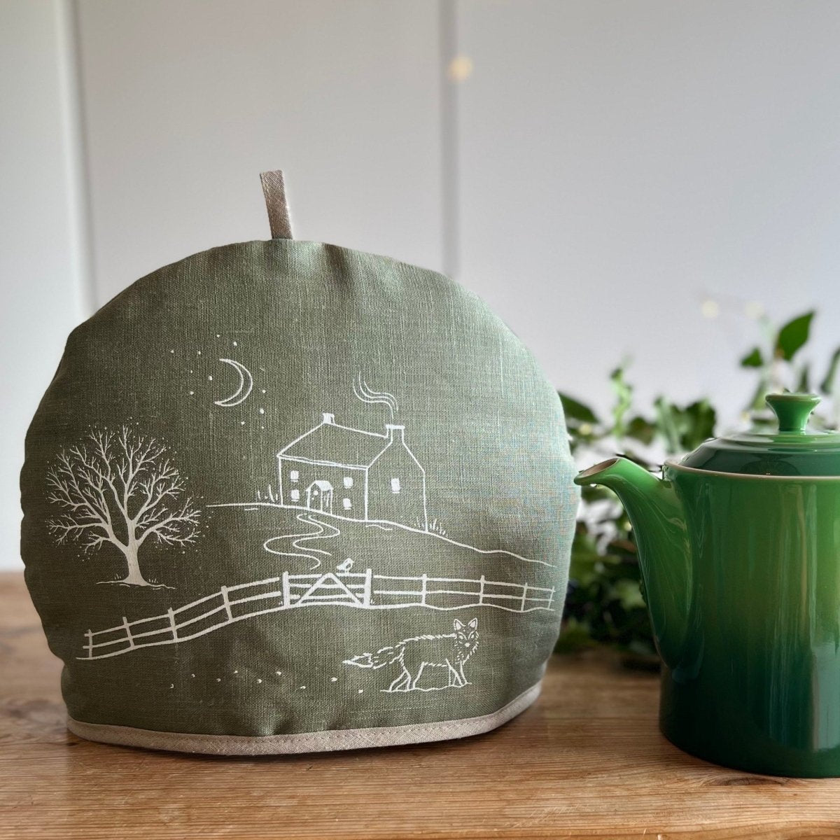 Sage Green Linen Tea Cosy from the Winter Fox Collection by Helen Round