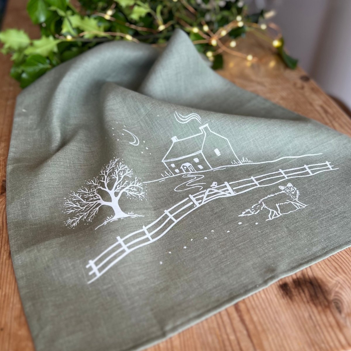 Sage Green Linen Tea Towel from the Winter Fox Collection by Helen Round