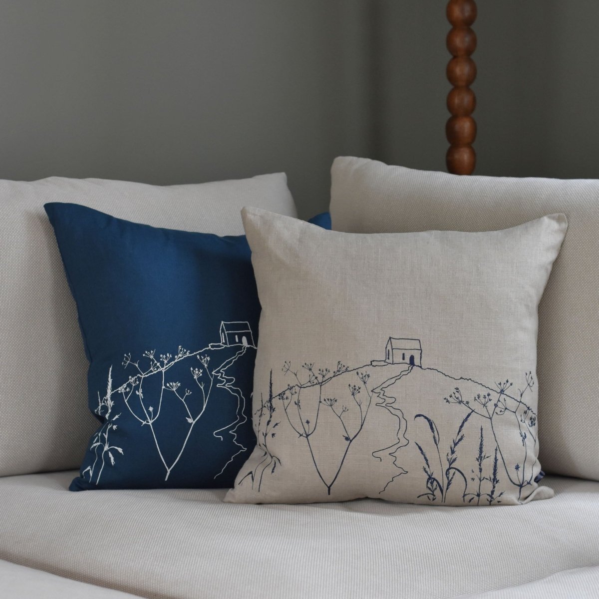 Natural and Navy Linen Cushions with hand printed design from the Rame Head Collection by Helen Round
