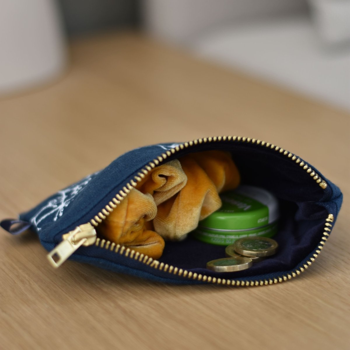 Navy Linen Rame Head Purse/Pouch with Brass Zip, filled with coins, lip salve and scruchie from Helen Round