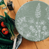 Sage Green XL bowl cover with the garden design printed on it, by Helen Round
