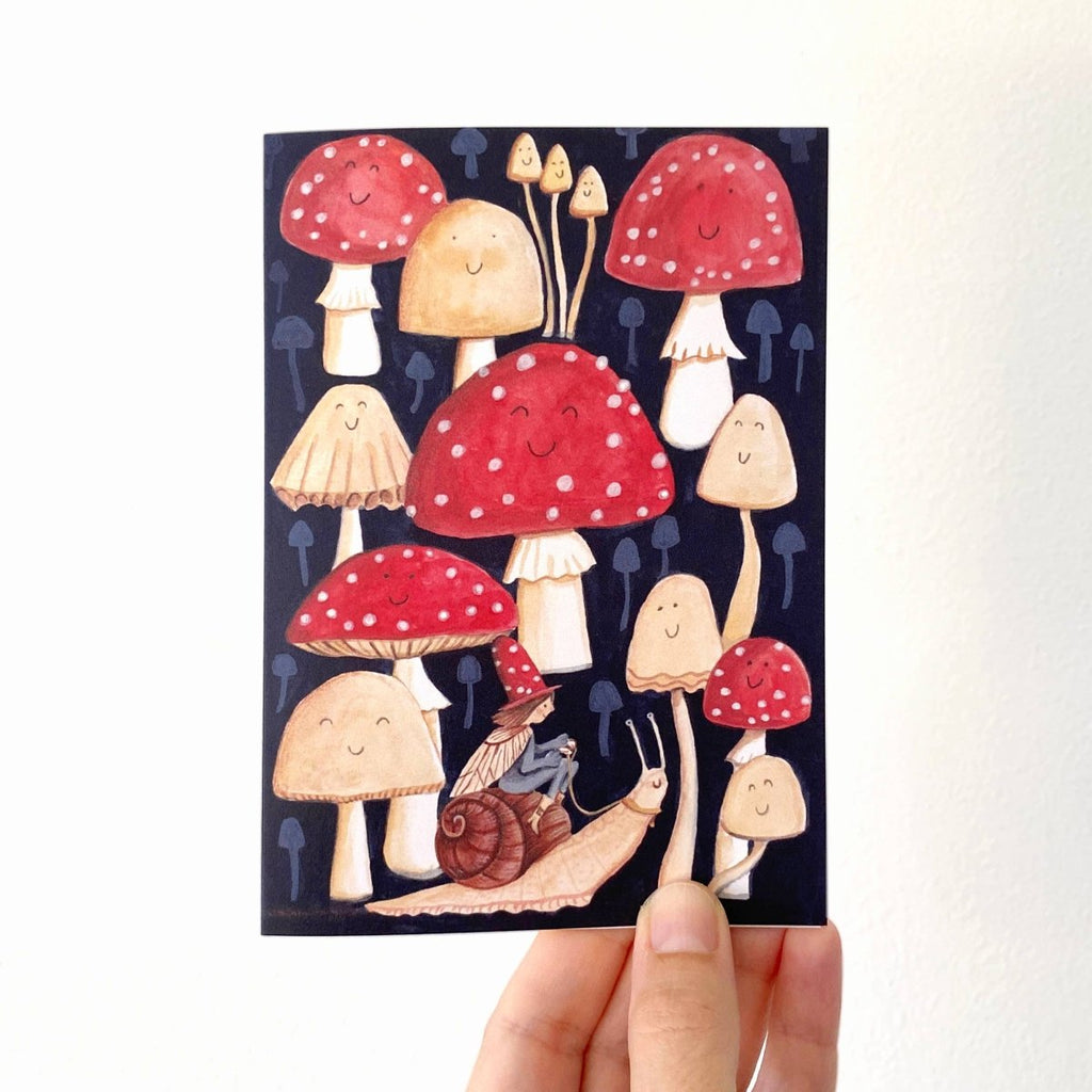 Illustrated card with smiling mushrooms and a snail on a white background sold by Helen Round