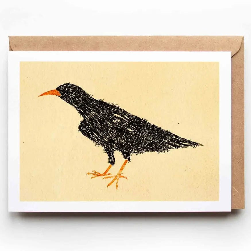 Card with a black bird illustration on a beige background, featuring a brown envelope.