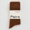 Brown sock with 'Pairs' label on a white background