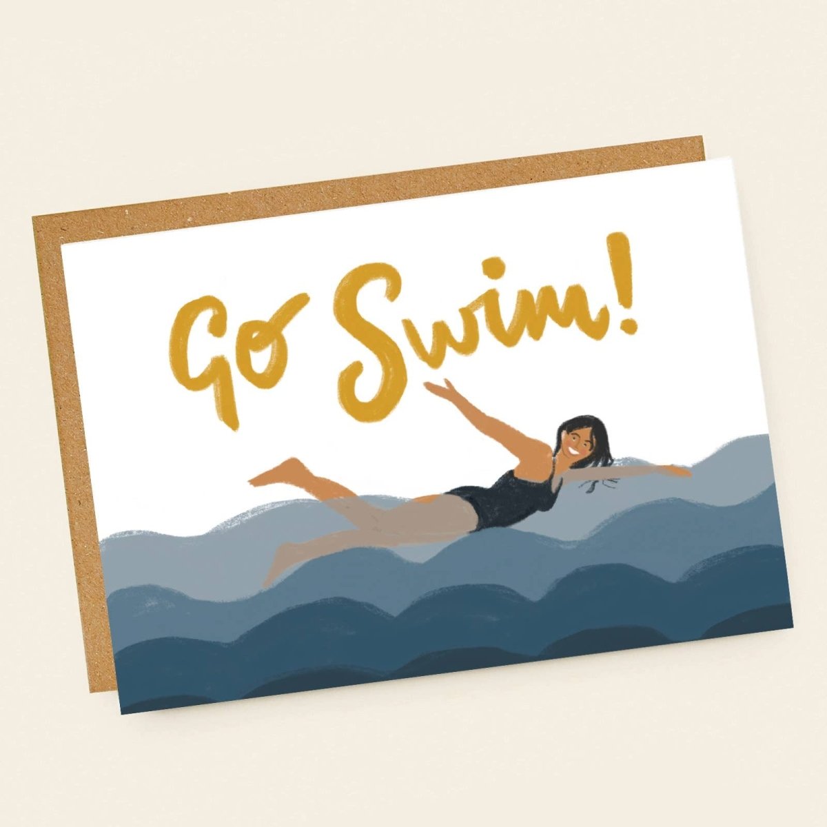 Greeting card with 'Go Swim!' text and a swimmer illustration on a wavy background sold by Helen Round