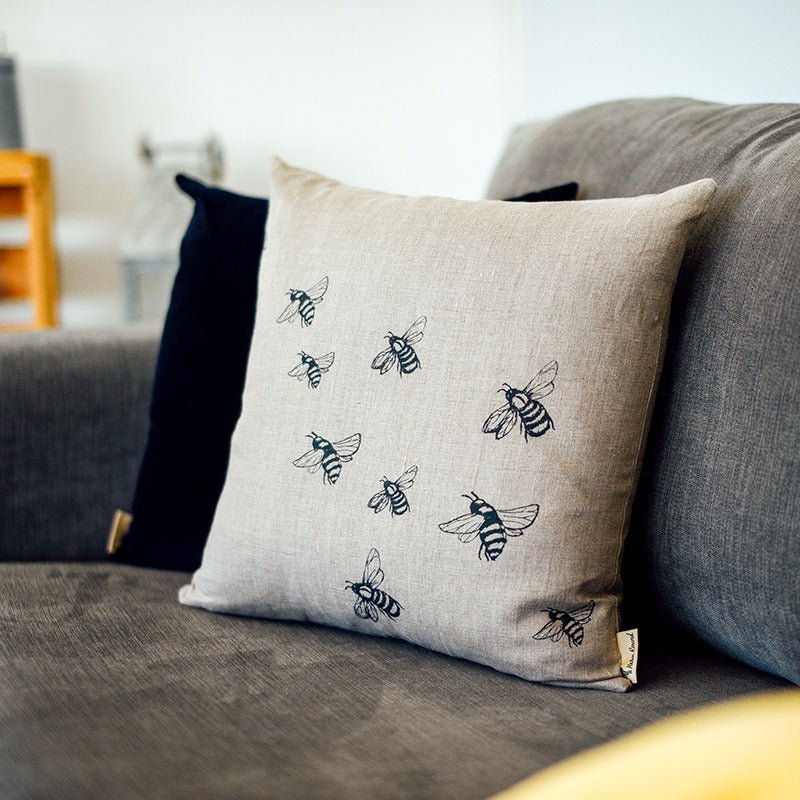 Natural Linen Cushion with Bee Design from the Honey Bee Collection. Handprinted in blue by Helen Round