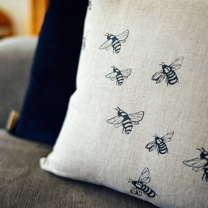 Natural Linen Cushion with Bee Design from the Honey Bee Collection. Handprinted in blue by Helen Round