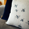 Bee cushion in natural linen