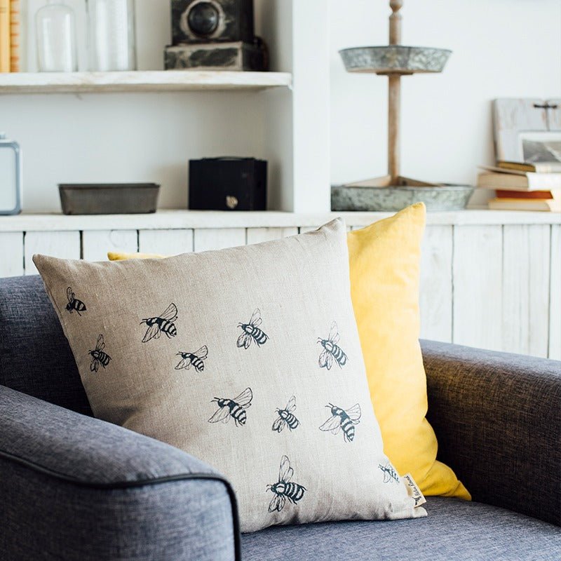 Natural Linen Cushion with Bee Design from the Honey Bee Collection. Handprinted in blue by Helen Round