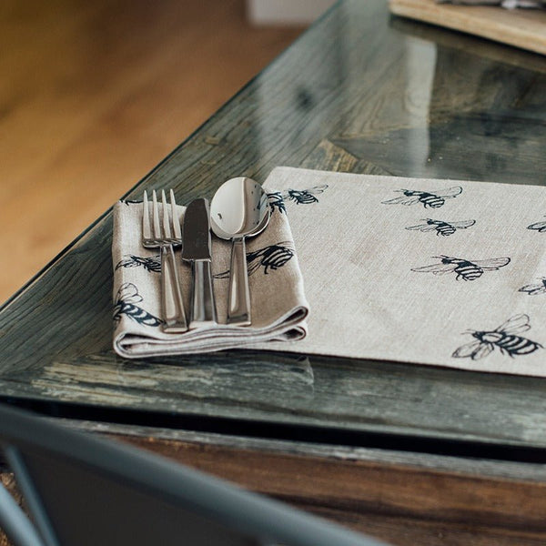 bee napkins in natural linen with bee design