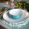 sage green linen placemat with Christmas design