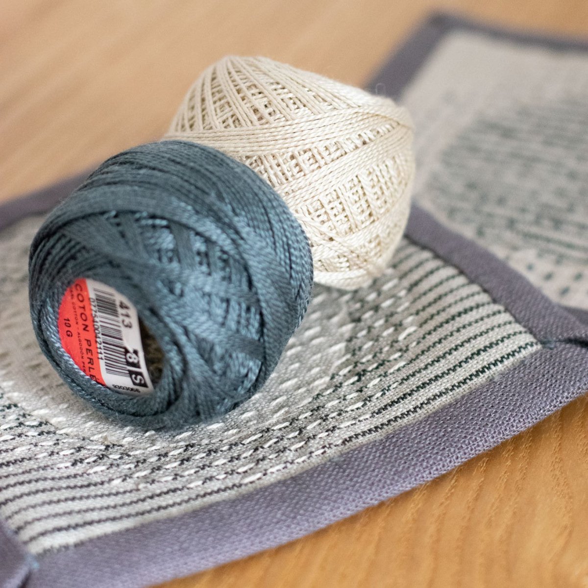 Cotton Perle Thread, 10g balls with Coasters to demonstrate use, Grey and Ecru