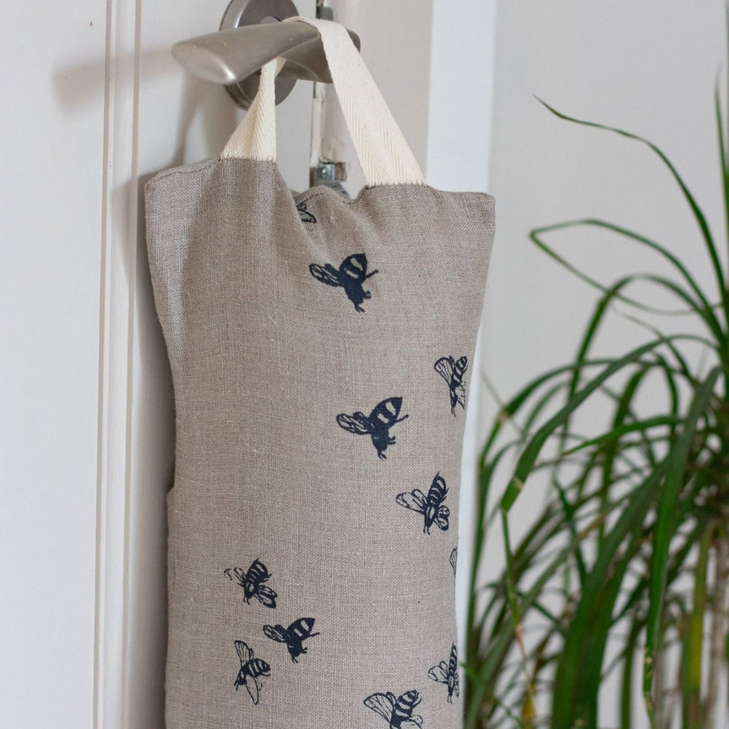 Bee Linen Draught Excluder Hanging on Door Handle from the Honey Bee Collection by Helen Round