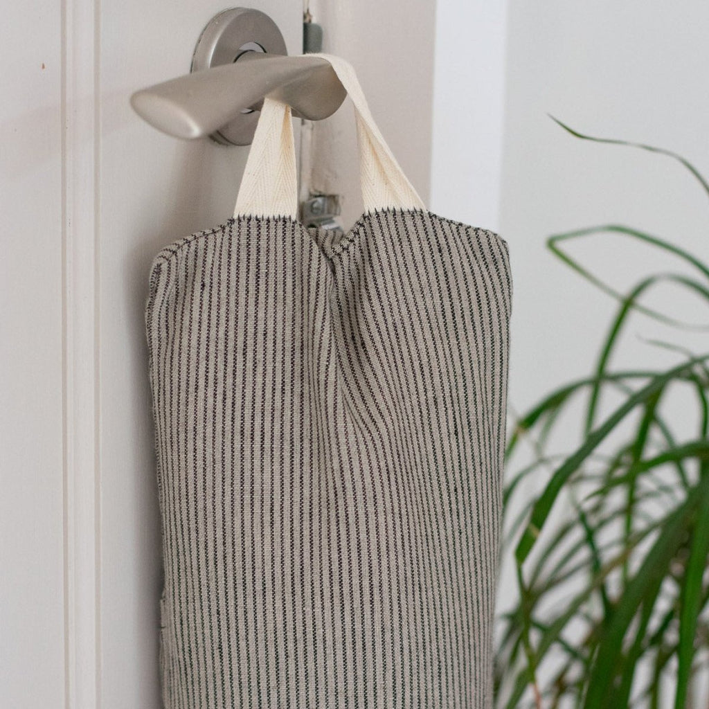 Close up of Striped Linen Draught Excluder from the Striped Collection by Helen Round