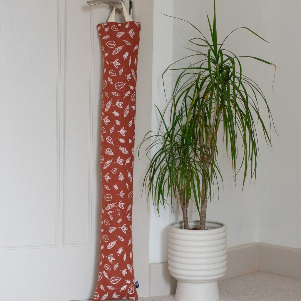 Leaf Design Linen Draught Excluder in Rust Coloured Linen from the Leaf Collection by Helen Round