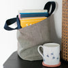 Large Striped Linen Storage Pot with Books and Bee Mug by Helen Round