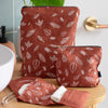 Toiletry Bag, Makeup Bag and Facial Wipes Kit in Rust Coloured Linen with a Leaf Design from the Leaf Collection by Helen Round