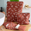 Leaf Linen Bathroom Range - featuring Toiletry Bag, Makeup Bag and Folding Face Wipes Kit in Rust Coloured Linen with Leaf Design from Helen Round
