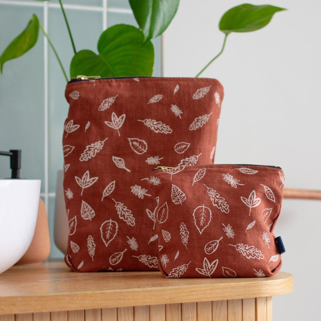 Rust Coloured Linen Toiletry Bag and Makeup Bag from the Leaf Collection by Helen Round