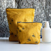 Mustard Linen Makeup Bag & Toiletry Bag with Bee Design from the Honey Bee Collection by Helen Round