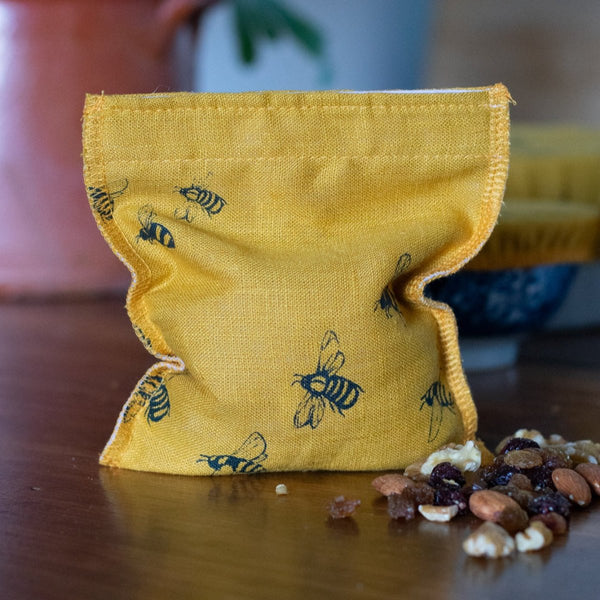 Bee Mustard Linen Snack Bag with nuts and raisins,  from the Honey Bee Collection by Helen Round