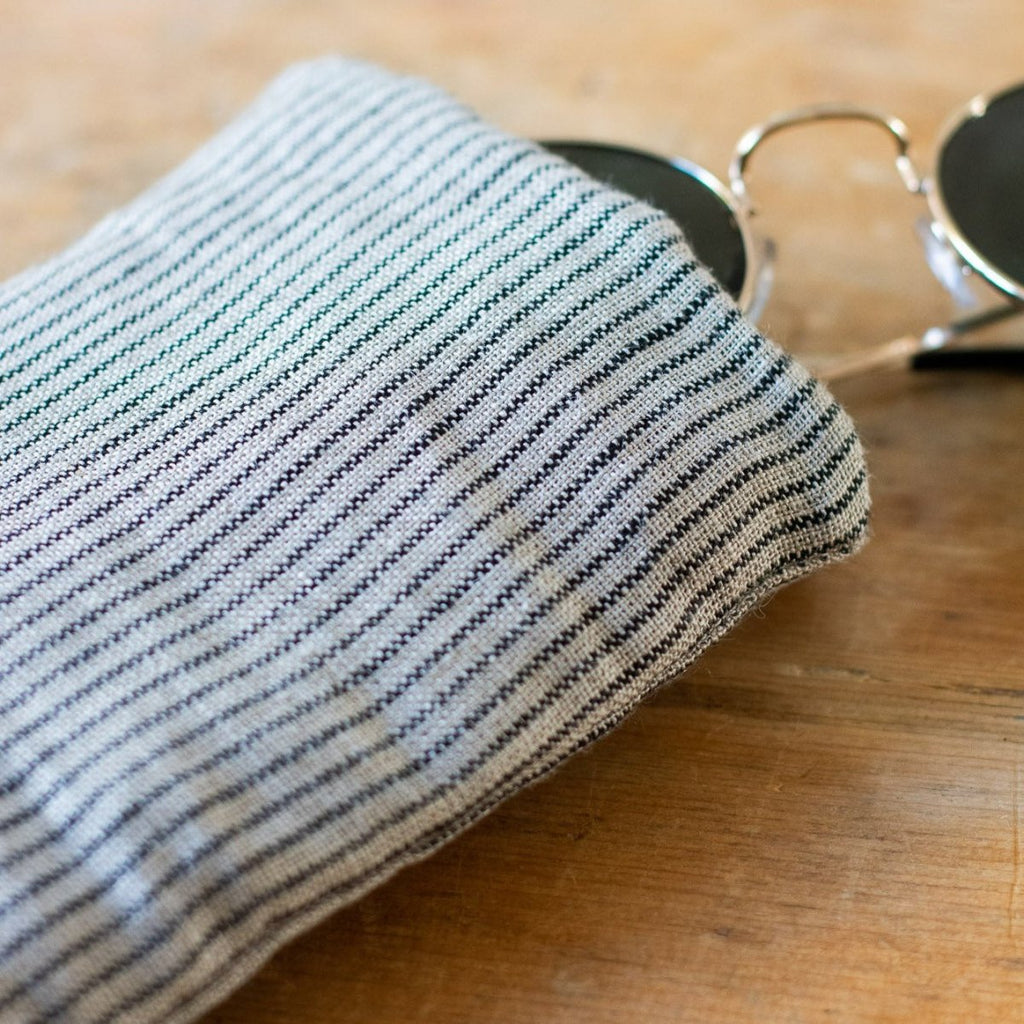 Close Up of Striped Linen Glasses Case in Fine Dark Blue/Natural Stripe from the Striped Collection by Helen Round