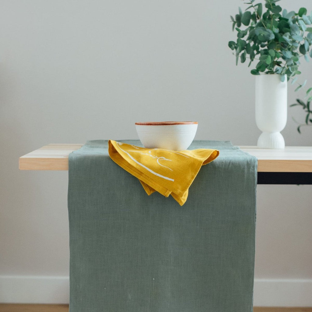 Natural linen table runner in sage green from Helen Round