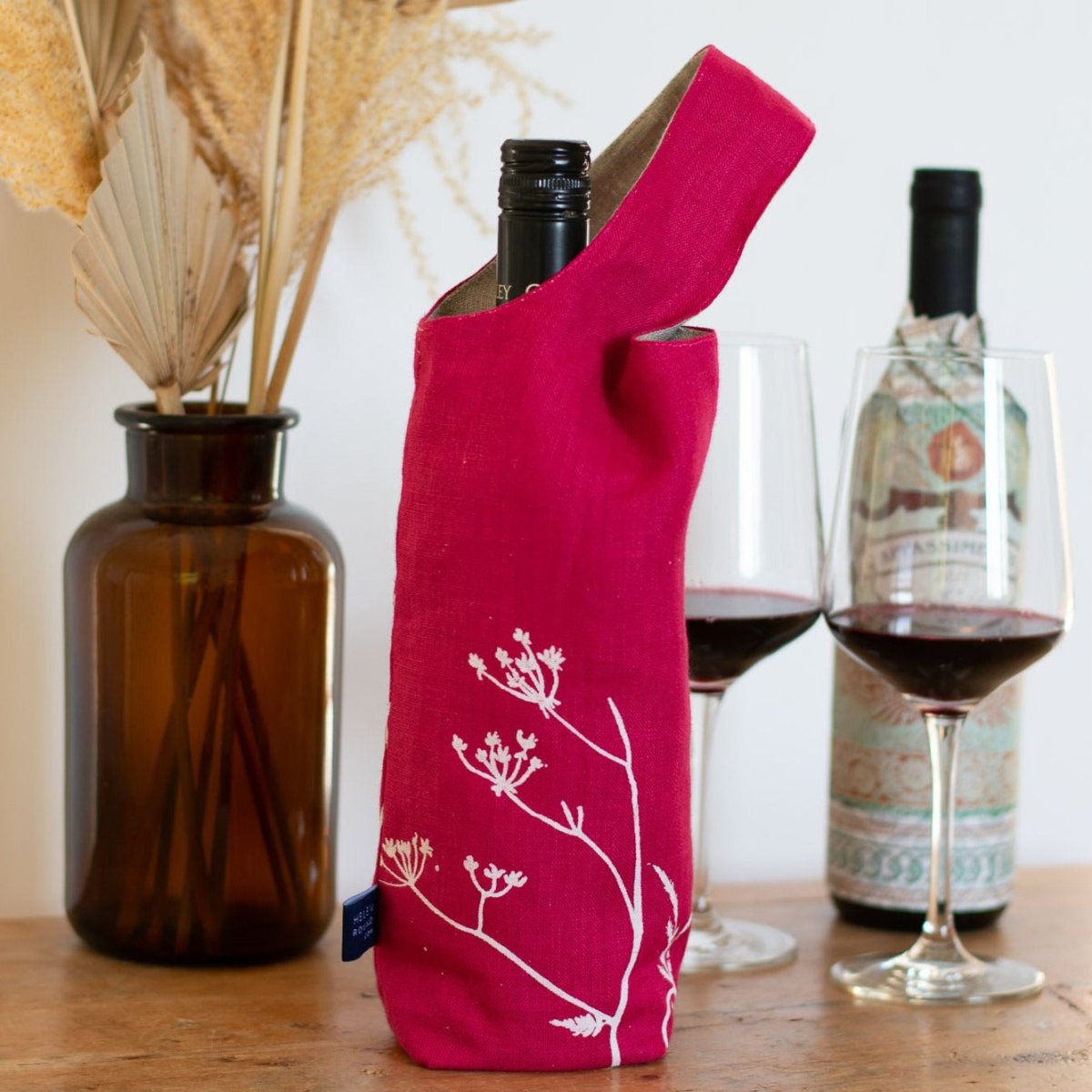 Linen Bottle Bag/Top in Raspberry Red Linen with Natural Linen lining with wine bottle from Helen Round