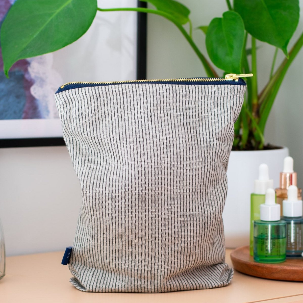 Striped Linen Toiletry Bag in Dark Navy/Natural Fine Stripes from the Striped Collection by Helen Round