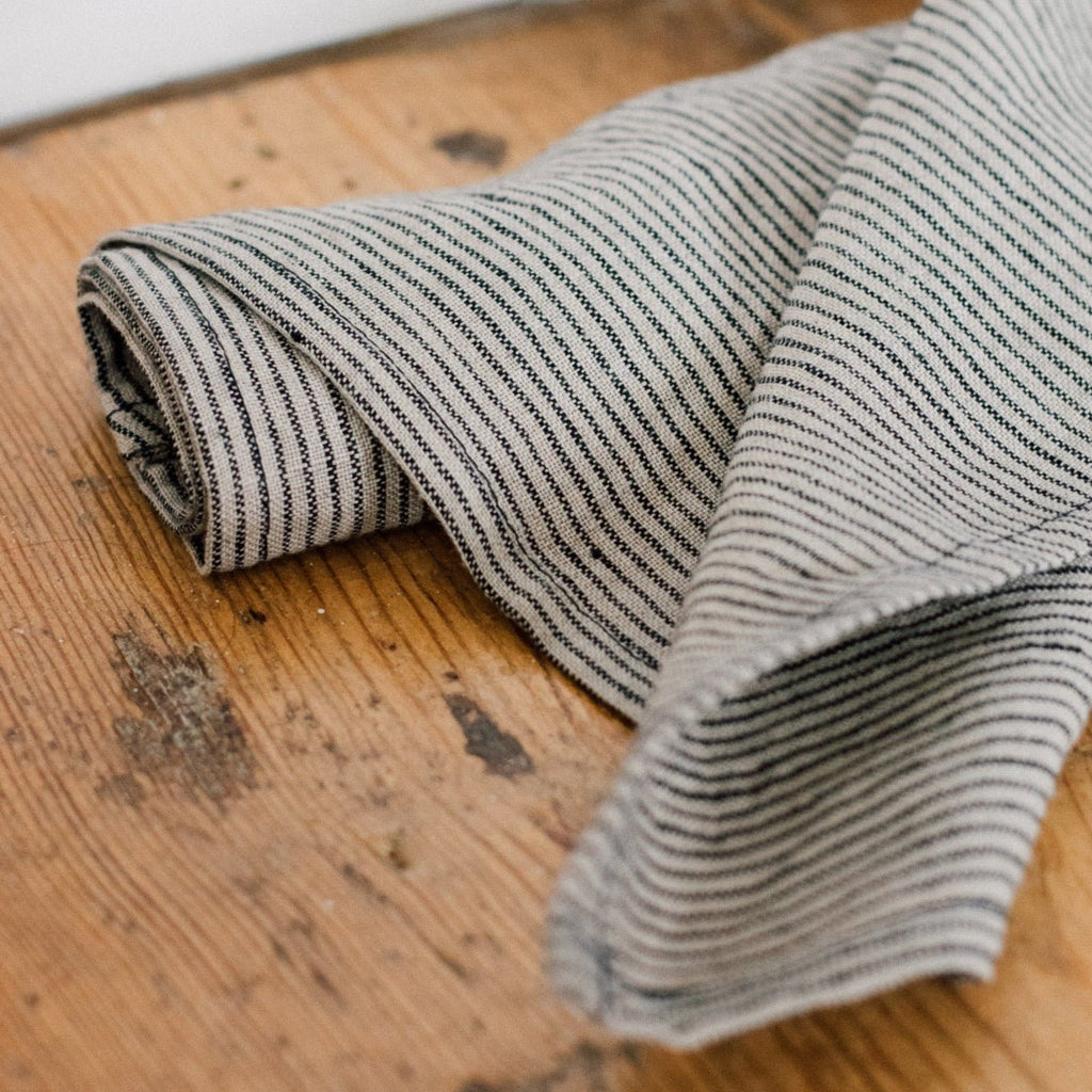 Roll of Natural Linen Fabric with Dark Blue Stripe