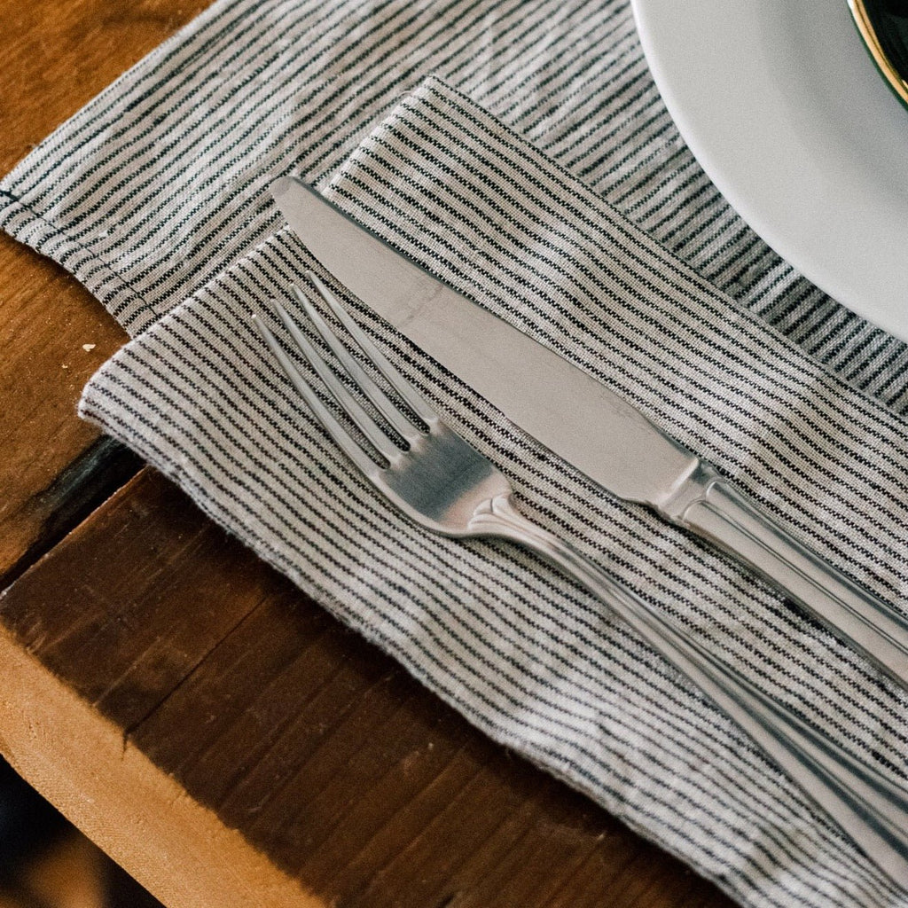 Close up of Striped Linen Napkins With Dark Blue and Natural Stripe from Helen Round